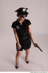 Woman Adult Athletic White Fighting with gun Standing poses Casual